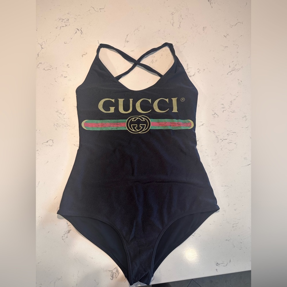 The original Gucci bodysuit when it first came out. And black color.